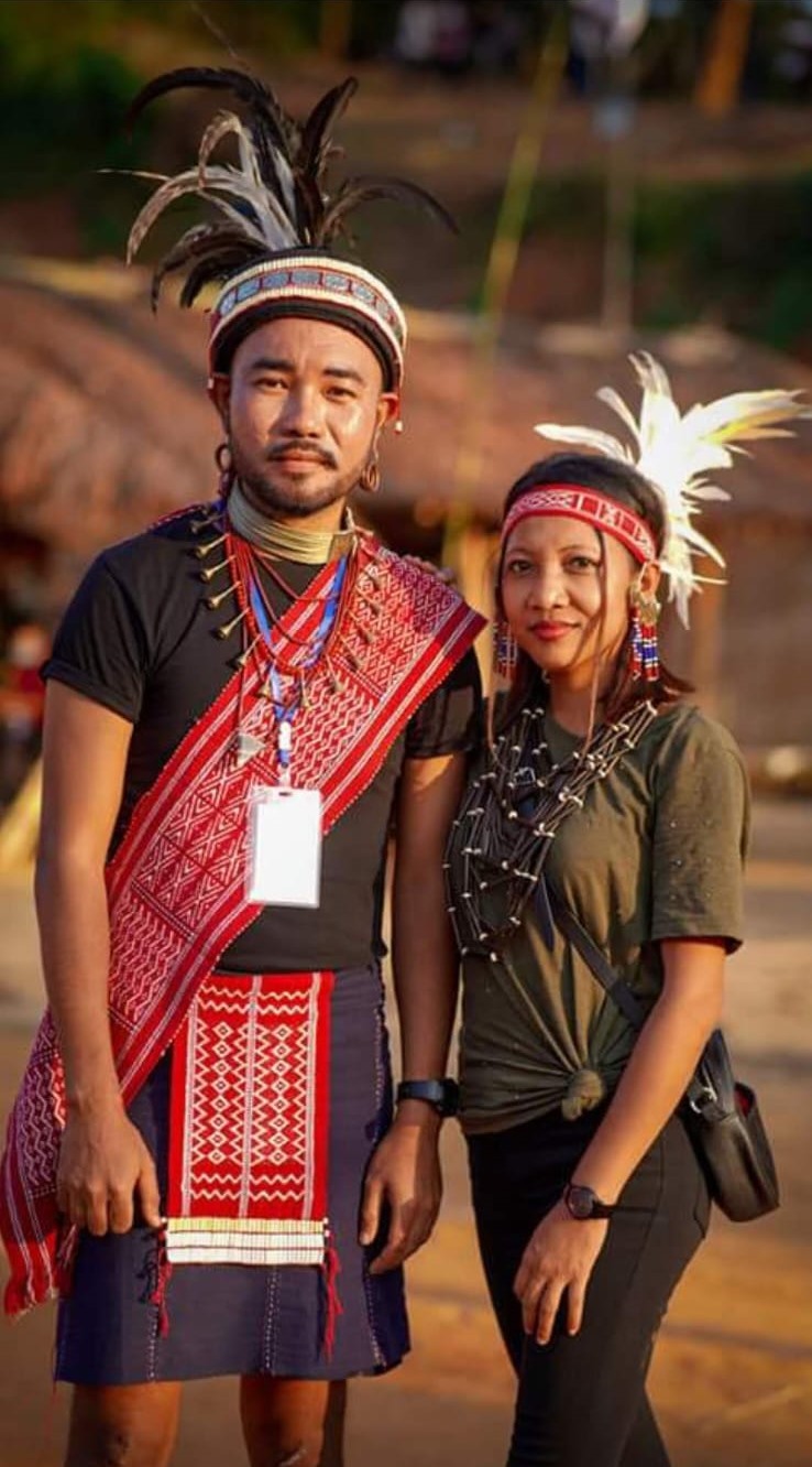 Visitors wearing traditional Garo dress